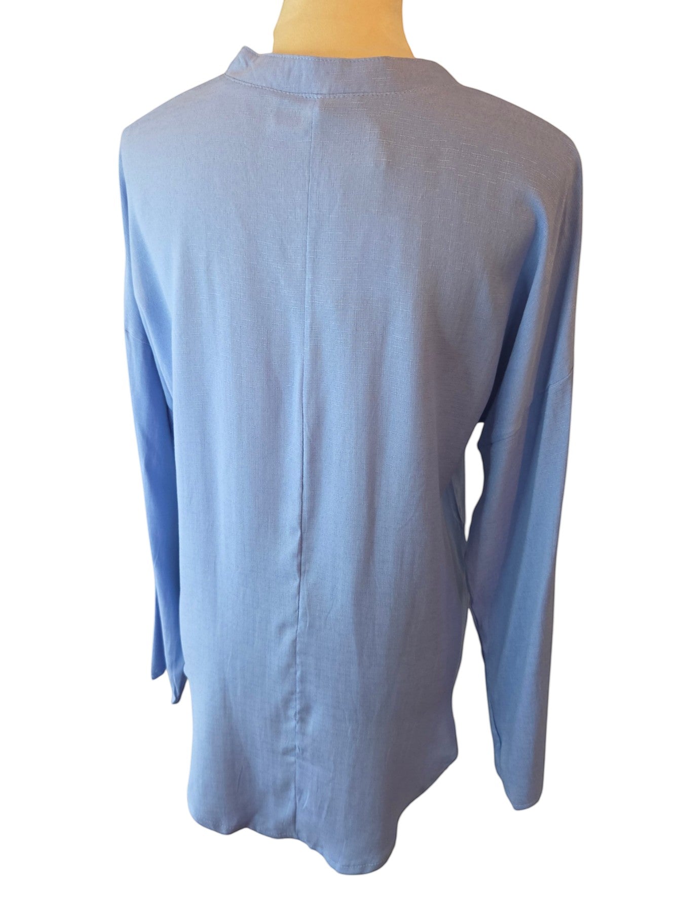 Birds of a Feather Boutique & Soy Wax Candle Company light blue long sleeve tunic top, back view of relaxed fit shirt