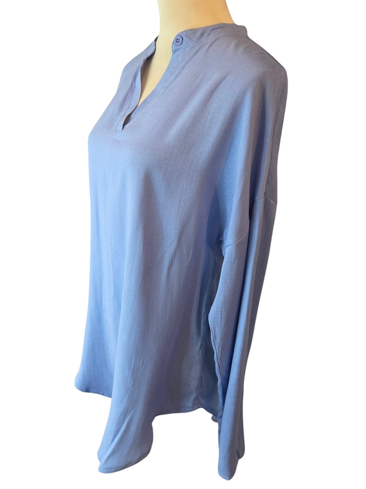Birds of a Feather Boutique & Soy Wax Candle Company light blue long sleeve tunic with a split neck and button detail