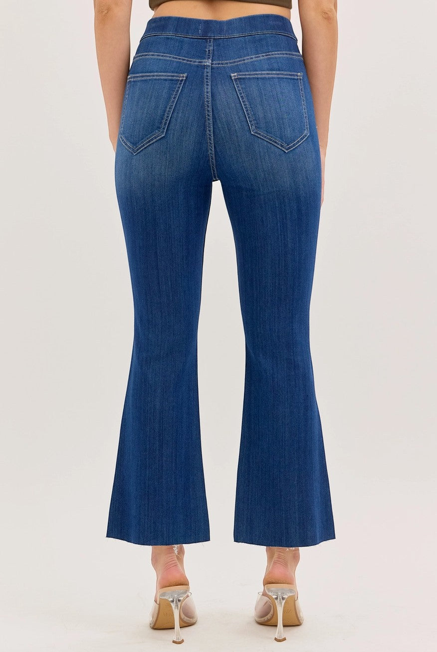 Birds of a Feather Boutique & Soy Wax Candle Company medium wash pull-on cropped flare denim jeans, back view.