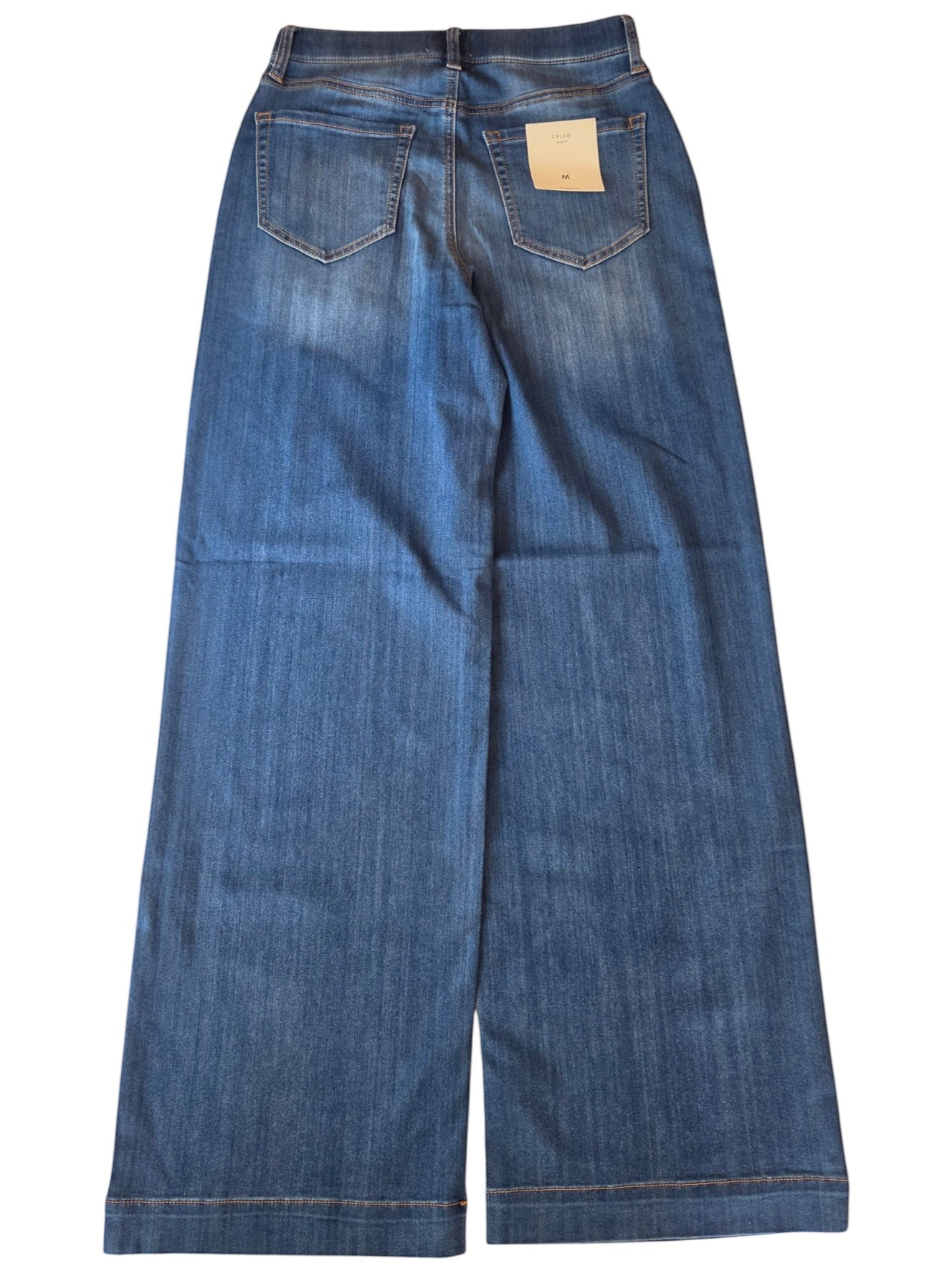Birds of a Feather Boutique & Soy Wax Candle Company high rise wide leg denim pants in medium wash blue with back pockets